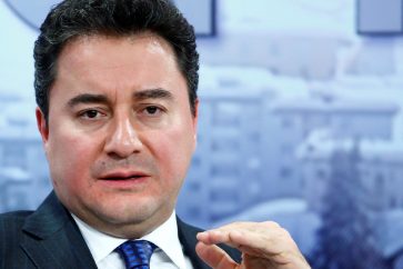 FILE PHOTO: Turkish Deputy Prime Minister Babacan gestures during the session 'Growing in Harder Times' in the Swiss mountain resort of Davos